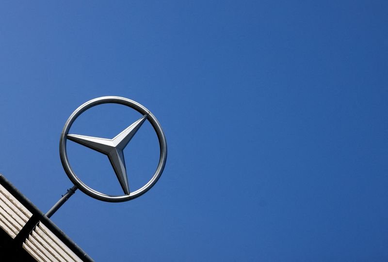 FILE PHOTO: The logo of Mercedes-Benz is seen outside a Mercedes-Benz car dealer in Brussels, Belgium June 1, 2023. REUTERS/Yves Herman/File Photo