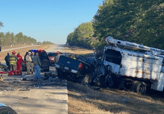 Two critically injured after driver of pickup crashes into parked bucket truck - KFDM-TV News