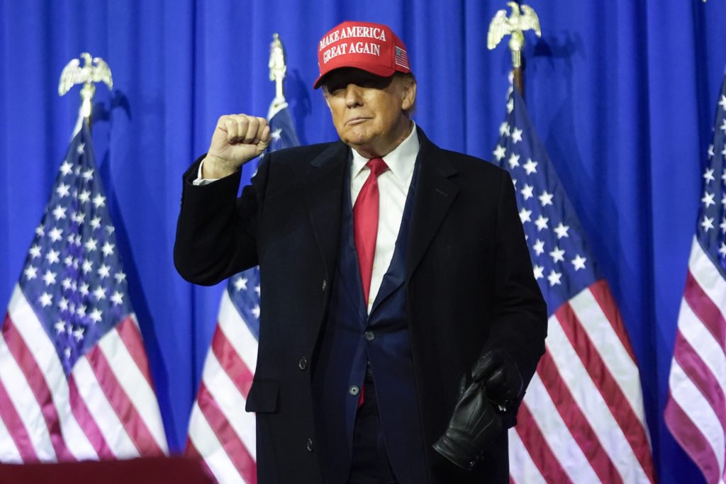 Republican presidential candidate former President Donald Trump gestures at a campaign rally in Waterford Township, Mich., Saturday, Feb. 17, 2024. (AP Photo/Paul Sancya)
