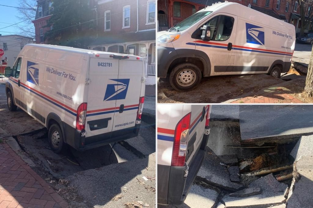 Mail truck freed after falling into sinkhole on Delaware street - New York Post
