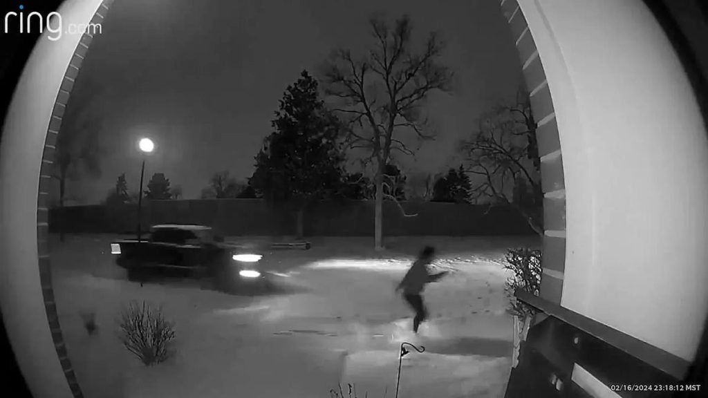 Chilling doorbell camera footage shows woman being chased by truck down dark Denver street before vanishing ou - Daily Mail