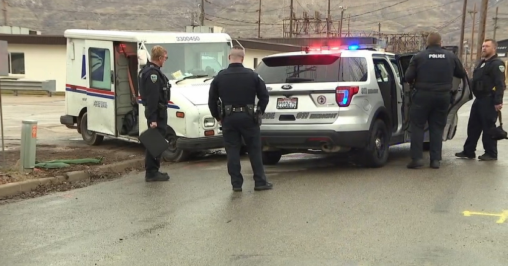 Suspect steals USPS mail truck, barricades himself inside - FOX 13 News Utah