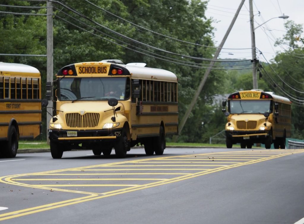 Students suffer minor injuries in school bus crash with utility truck, cops say - NJ.com