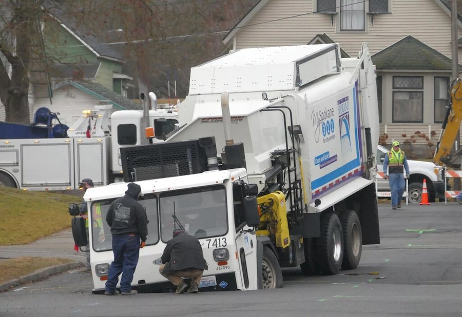 Spokane recycling truck falls through street - East Idaho News