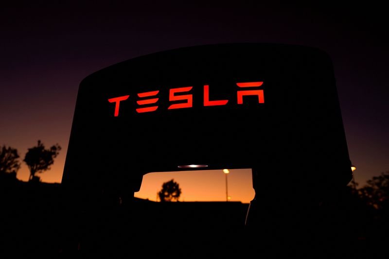 A Tesla supercharger is shown at a charging station in Santa Clarita, California, U.S. October 2, 2019. REUTERS/Mike Blake/File Photo