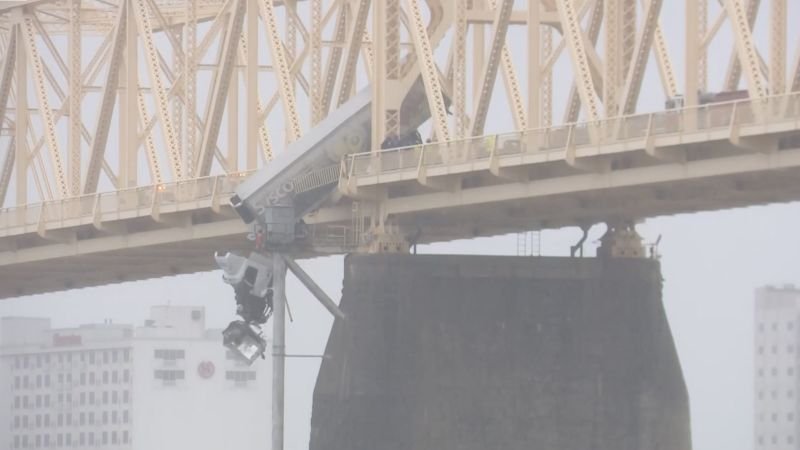 See the ‘harrowing’ rescue of driver from truck dangling off bridge - CNN