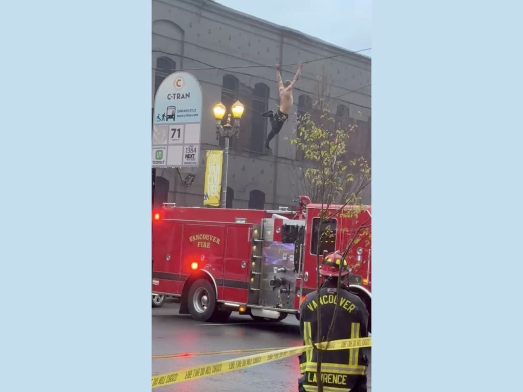 Man dangling from overhead wire in downtown Vancouver plummets onto fire truck - OregonLive