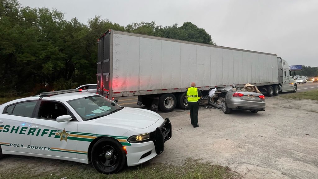 Lakeland man dies after car becomes wedged under semi-truck during crash: PCSO - FOX 13 Tampa