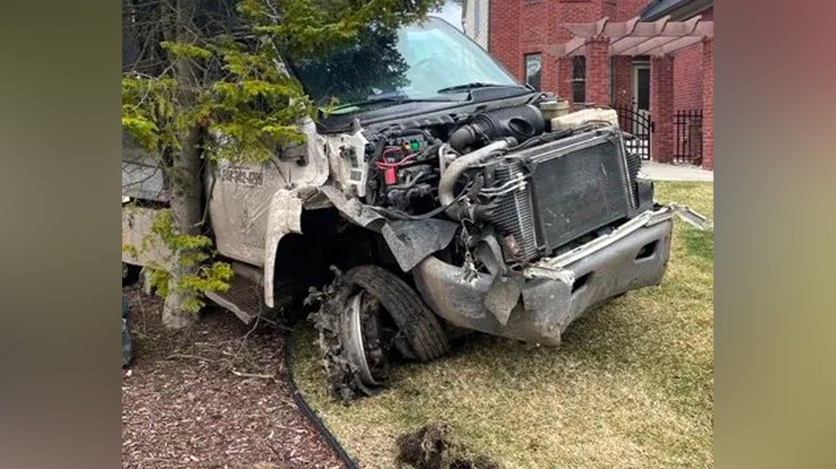 Michigan man steals dog at gunpoint, leads police on chase in stolen tree trimming truck before crashing: PD - Fox News