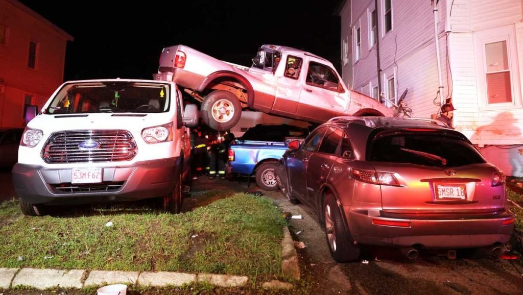 Wild crash: Pickup truck lands on top of vehicles in Mass. city - WCVB Boston