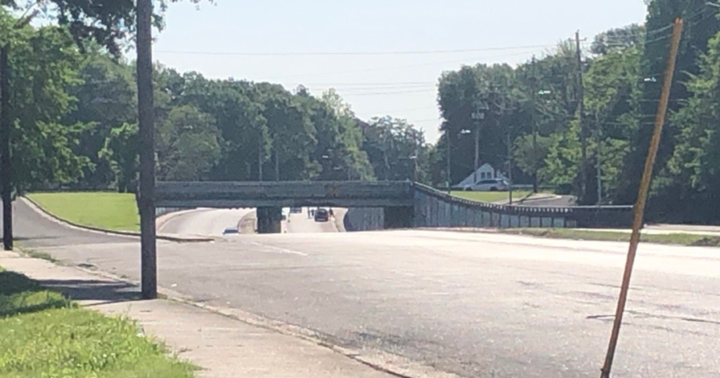 Concrete falls on road after truck hits overpass - FOX13 Memphis