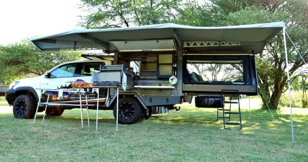 Hogzilla 4x4 expander truck camper doubles in size via sliding bedroom - New Atlas