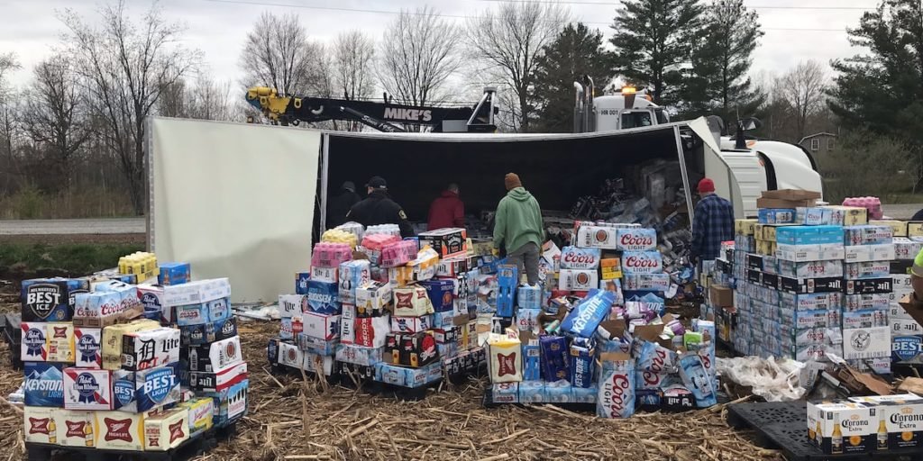 Sheriff: Truck loaded with beer flips on its side after deer runs in its path - WNEM