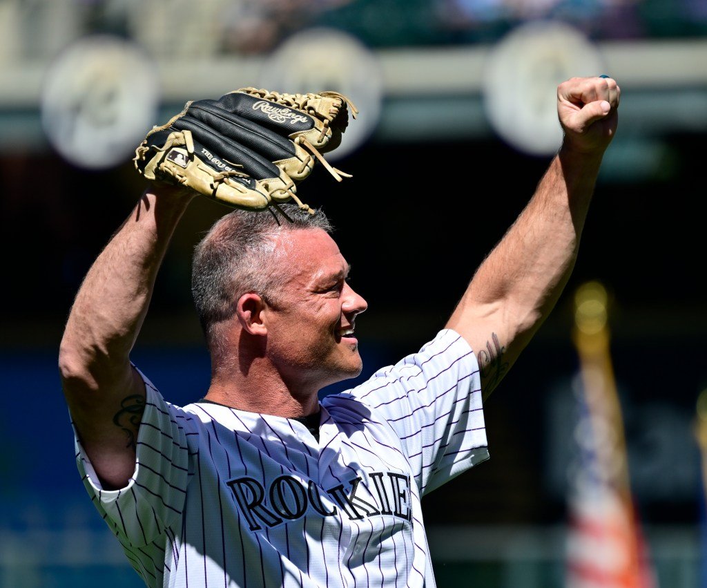 Denver police officer hit by fire truck during Nuggets parade rejoins SWAT team, throws first pitch at Rockies opener - The Denver Post