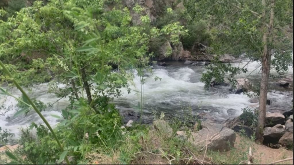 Child dies after truck overturns, ends up in Clear Creek - 9News.com KUSA