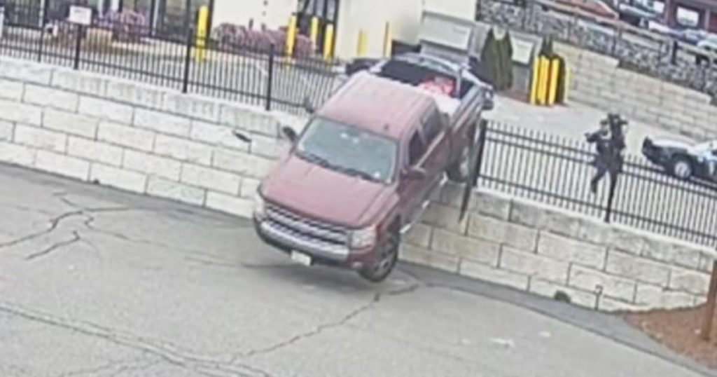 Video shows pickup truck crash through fence during police chase in Middleton - CBS Boston