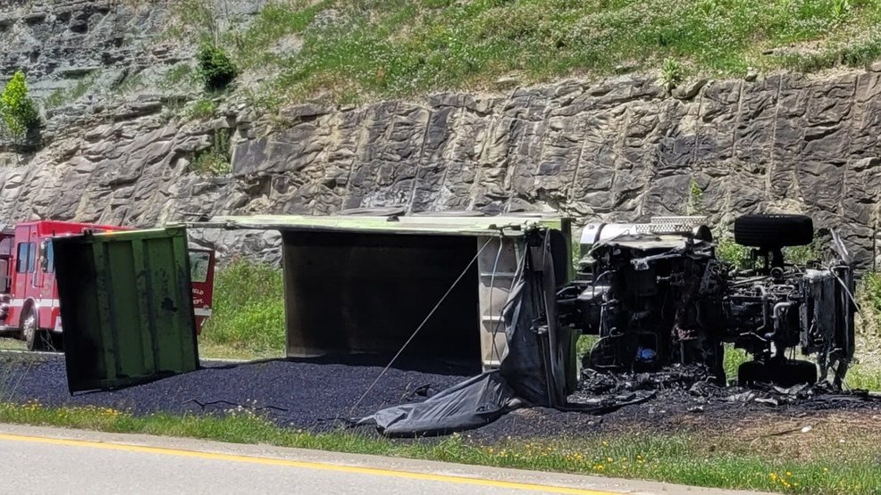Truck overturns and catches fire, stalling traffic along Route 35 in Putnam County - WCHS