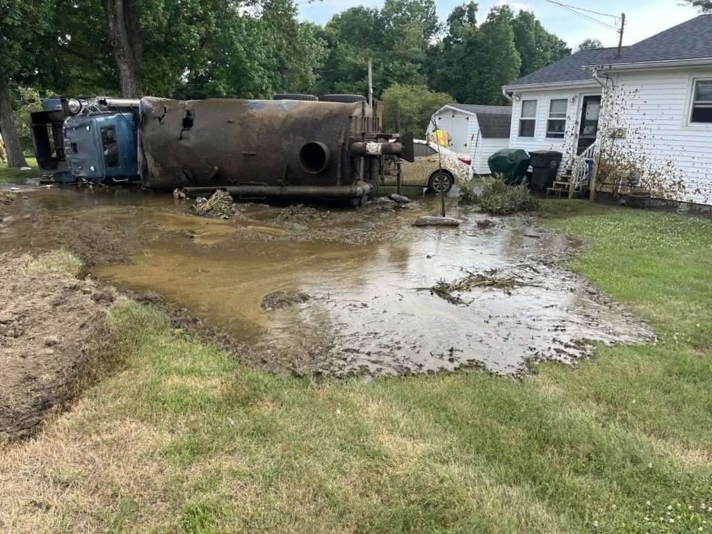 Manure truck tips over into Pomfret woman’s yard - WTNH.com